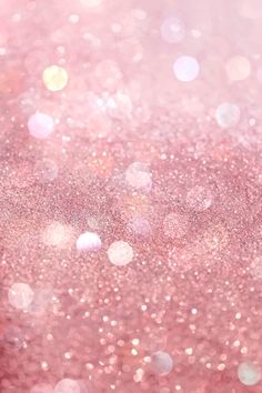 pink glitter background with lots of small white dots