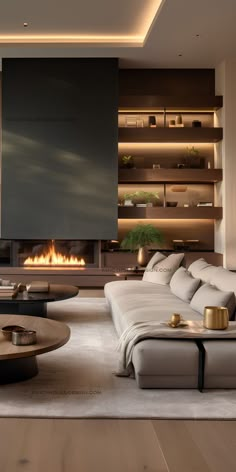 a modern living room with white furniture and a fire place in the fireplace behind it