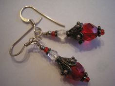 ruby slipper collection unique one of a kind earrings Faceted glass bead with silver findings Ruby Slipper, Ruby Slippers, Faceted Glass, Glass Bead, Jewelry Making Beads, Jewelry Earrings Dangle, Etsy Earrings, Glass Beads, Dangle Drop Earrings