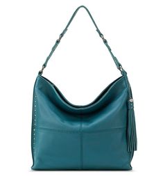 Silverlake City Hobo Teal The soft pebble leather of this timeless silhouette makes this bag your new everyday bag! With a zipper closure, spacious interior, and stylish slouch, this bag is perfect to carry all of your essentials and more!Exterior: LeatherInterior: Repreve LiningAntique silver-tone hardwareMain zipper closureBack zipper pocketInterior contains 2 front slip pockets, 1 back wall zipper pocket, and 1 slip pocketStudded detail and single shoulder strapFeatures hand-crafted leather t Vegan Purses, Polished Pebble, Chic Leather, Over 50 Womens Fashion, Silver Lake, Leather Hobo Bag, The Sak, Leather Tassel, Hobo Handbags