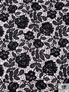 black lace fabric with flowers on it