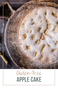 an apple cake with powdered sugar on top and the words, gluten - free apple cake above it