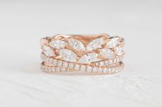 a close up of a ring with diamonds on it