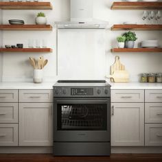 a kitchen with open shelving and an oven