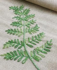 an embroidered plant is shown on the screen