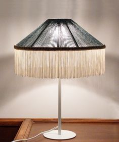 a lamp that is on top of a table