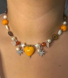 This cute orange pop necklace from our beaded choker collection made with stone beads and glass beads DM if you have any customizations in mind  Fallow me on Instagram @ztarrjewelery 💗✨ and thank you for you're support even if it's just a fallow or a like any support helps❤️😁! Layered Necklaces Beaded, Chunky Beaded Jewelry, Beading Necklaces Ideas, Handmade Orange Necklace, Handmade Unique Orange Necklaces, Beaded Choker Ideas, Fall Beaded Jewelry, Orange Beaded Glass Necklaces, Vintage Handmade Orange Necklace