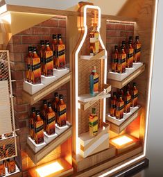 a lighted display case with bottles in it