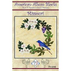 the front cover of an applique book with a blue bird and flowers on it