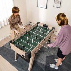 Let your family enjoy the foosball game at home with this freestanding foosball table! The game set will be a perfect gift for kids, teens, or adults to enjoy competitive fun. It comes with 2 soccer balls, 2 soccer goals, 2 bead scorers, and 26 white & black players to ensure an authentic foosball game. The metal rods and smooth handles allow for easy control. In addition, measuring 54" x 26.5" x 33.5"(L x W x H), it is ideal for 2 to 4 people of all ages to have fun. It can be widely used in ga Soccer Goals, Home Game Room, Game Room Bar, Game Room Family, Foosball Table, Foosball, Soccer Game, Soccer Goal, Puzzle Set