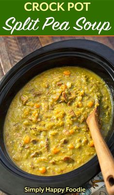 a crock pot split pea soup in a black bowl with a wooden spoon next to it