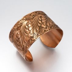 COPPER Bracelet, Solid COPPER Cuff, Copper Cuff Scroll Design, Lacquered Copper Cuff Bracelet, Copper Cuff Bracelet □ Antiqued Copper Cuff - 1 Piece □ Size: 1.5 inches wide - Scroll design SOLID COPPER, not plated Stunning detail on these beautiful embossed cuffs. These are very sturdy but adjustable The tooling dates back to the 1940s and cannot be duplicated in today's market. Unlike my raw cuff collection, these special pieces are hand antiqued, hand polished and have a baked lacquer coating Adjustable Engraved Wide Band Cuff Bracelet, Adjustable Wide Band Engraved Cuff Bracelet, Copper Etched Bracelets As A Gift, Engraved Copper Bracelet Jewelry, Adjustable Etched Cuff Jewelry, Adjustable Etched Wide Band Jewelry, Antique Adjustable Cuff Bracelet Gift, Adjustable Etched Bronze Bracelets, Adjustable Wide Band Etched Jewelry