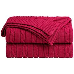 two blankets folded on top of each other in maroon color, with cable knits