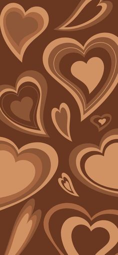 many hearts are arranged in the shape of heart shapes on a brown background with white swirls