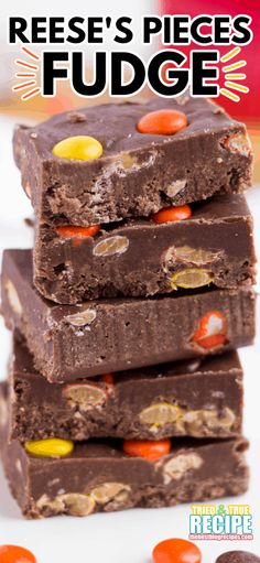 reese's pieces fudge is stacked on top of each other with candy in the middle