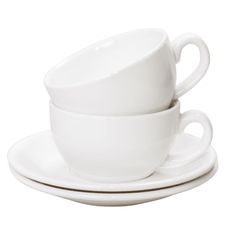 three white cups and saucers stacked on top of each other