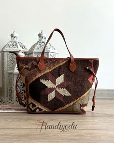 "This colorful and practical handmade Turkish Kilim hand bag is one of our unique collection of top quality hand-woven vintage bags that combines Turkish rich culture and modern design. The Turkish Kilim wool carpet are sourced from various regions of Turkey. Each of our handwoven old rugs is different and you end up with a unique vintage bag, that really stands out everywhere you go. All our products are eco-friendly, no synthetic fibers and chemicals are used. We use best genuine leather, YKK zippers and brass hardware in the manufacturing of our Kilim products. If you want a piece of art that has a rich history of stories and emotions, our bohemian bags are the right choice for you. SIZE: L44cm H30cm W16cm L17.5″ H12″ W6″ ITEM DETAILS: - 100% handmade - Handwoven old Kilim rug - High qu Mini Sling Bag, Kilim Bag, Kilim Pattern, Bohemian Bags, Into The West, Carpet Bag, Modern Kilim, Rug Bag, Soft Clothes