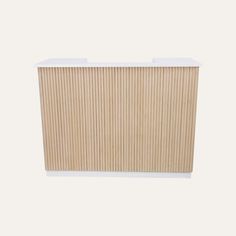 a beige and white radiator with vertical blinds on the side, against a white background