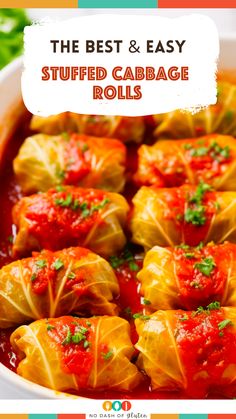 the best and easy stuffed cabbage rolls in a white bowl with red sauce on top