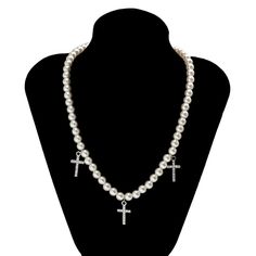 Add some refinement to your outfit with the Iced Cross Pendant Pearl Necklace - crafted with high-quality materials, this necklace features a unique combination of an iced cross pendant and pearls, making it a versatile and sophisticated addition to any outfit. Realistic Pearls made of Shells PREMIUM Quality: Hand-finished necklace design No form of discomfort on your skin Clean pearl details Size: 18 inch FREE STANDARD SHIPPING & Life time Guarantee Beaded Pearl Necklace, Pearl Details, Necklace Design, Diamond Cross Pendants, Necklace Craft, Diamond Cross, Pearl Pendant Necklace, Life Time, Clean Skin