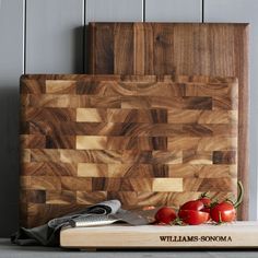 a cutting board with some tomatoes on it