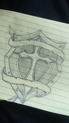 a drawing of a helmet on lined paper