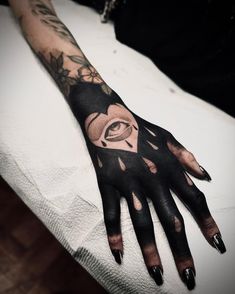 Crying eye black ink hand tattoo Black Fingers Tattoo, Left Right Tattoo, Black Finger Tattoo, Black Out Arm Tattoo, White Tattoo Aesthetic, Blackwork Hand Tattoo, Full Hand Tattoos, Tattoo Art Ideas, Andrew Wilson