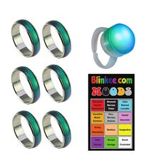 four rings with different colors and sizes are shown in front of a card board that says blinkkeee com