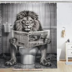 a shower curtain with a lion sitting on the toilet reading a newspaper in front of it