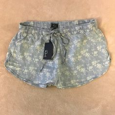 Rails Floral Dolhin Shorts Size L In Color Blue Made Of 100% Tencel Feature An Elastic Drawstring Waist. Machine Wash/Tumble Dry. New With Tag. Spring Casual Cotton Pajama Shorts, Casual Cotton Pajama Shorts For Spring, Casual Cotton Pajama Shorts For Summer, Beachy Cotton Pajama Shorts For Summer, Comfortable Blue Summer Shorts, Comfortable Blue Shorts For Summer, Blue Beachy Cotton Bottoms, Beachy Blue Cotton Bottoms, Beachy Blue Cotton Shorts