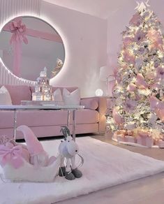 a living room decorated in pink and white