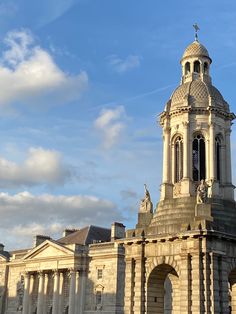 an old building with a clock tower on top