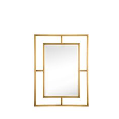 a gold framed mirror on a white wall