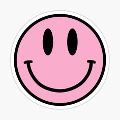 a pink smiley face sticker