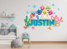 a child's room with a wall decal that says, just in the ocean