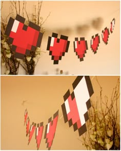 two pictures of red and black paper hearts hanging from the side of a wall next to a vase with flowers in it