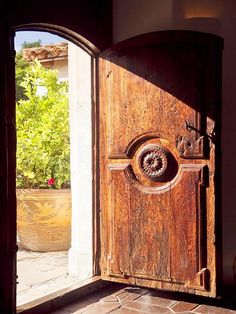 an open door with the words accents of salado tuscan style decorating ideas