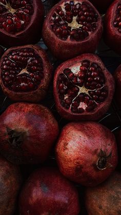 the pomegranates are cut in half and placed on top of each other