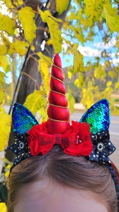 This beautiful black and red unicorn horn is proudly handmade in Canada in the heart of the Nicola Valley, British Columbia.  Headband is hand woven and ears are handmade assembled and flowers are hand sewn.  Headband underneath is metal so more durable.  These are high quality and well loved by kids for birthday parties or just for fun and for adults attending raves and music festivals.  Thank you for checking out my shop!  Note there ma he variations depending on current stock Christmas Photos With Santa, Red Unicorn, Unicorn Horns, Blue Unicorn, Birthday Headband, Black Unicorn, Unicorn Headband, White Unicorn, Hair Band For Girl