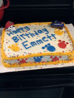 a birthday cake that is sitting on a table