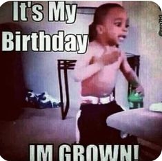 a young boy sitting on top of a chair in front of a tv screen with the caption it's my birthday i'm grown