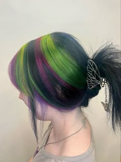 green, magenta, purple, black, striped hair. Chunky highlights Chunky Highlights Scene Hair, Green And Purple Peekaboo Hair, Green Black And Purple Hair, Purple And Green Hair Streaks, Black Hair With Rainbow Streaks, Black Hair Magenta Highlights, Green And Black Chunky Highlights, Black Hair Colorful Highlights, Green Hair With Blonde Highlights