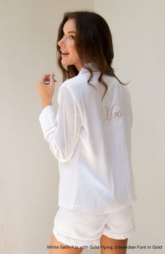 Our Satin PJ Sets are perfect for getting ready for the big day or even for your bachelorette party. With white piping on the color PJ sets, you can customize the white PJ piping to any PJ color. Available in 4 styles! ★ Short  Sleeves + Shorts ★ Short Sleeves + Pants ★ Long Sleeves + Shorts ★ Long Sleeves + Pants   With many options for embroidery, add your name, your bridal parties titles even your monogram! Please follow the instructions below and in the listing photos. As always, the messages are open for any questions Sizes Available: Sizing is in US Dress Sizing: Extra Small (XS), Small (S), Medium (M), Large (L) and Extra Large (XL), XXL and XXXL Please see the size chart and order accordingly. Please let me know the size along with the other details in the personalization section/n Fitted Satin Sleepwear For Wedding, White Bridesmaid Gift Sets, White Sets For Bridesmaid Gift, Long Sleeve Satin Sleepwear For Wedding Night, White Long Sleeve Sleepwear For Wedding, White Satin Wedding Sleepwear, Bride Pjs, Bridal Pjs, Bride Pajamas