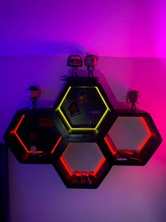 the hexagonal shelf is lit up with neon lights