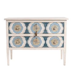 a white and blue dresser with flowers painted on the front, two drawers below it