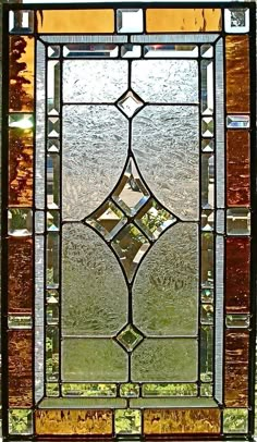 a stained glass window with an abstract design