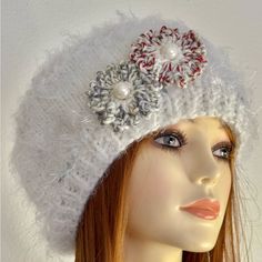 I Am Designer And Creator Of My “Hand Knits 2 Love” Brand. Add A Touch Of Romance To Your Winter Or Fall Ensemble With This Hand Knits 2 Love Slouch Hat Beanie Cap Beret Tam. The White Knit Hat Features Delicate Hand-Knit Flowers With Beads As Accents That Lend A Feminine Touch To Your Outfit. The One Size Fits All Hat Is Ultra Soft With Mohair Look. This Hand Knits 2 Love Hat Is A Handmade Piece, Crafted In The United States, And Perfect For Women Who Love Designer Chic. Its Romantic Floral The White Knitted Beanie Hat, White Crochet Hat, One Size Fits All, White Hand Knitted Brimmed Hat, White Hand-knitted Brimmed Hat, White Knitted Yarn Hat, White Knitted Hat, One Size Fits Most, White Knitted Hat One Size Fits Most, White Brimmed Crochet Hat, White Hand Knitted Beanie Hat