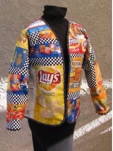 a mannequin wearing a jacket made out of food and candy bars on it