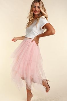 This Asymmetric Tiered Tulle Midi Skirt With Lining features a flirty A-line silhouette and elegant tiered embellishments, creating a feminine and stylish look. The crochet print adds a touch of texture while the elastic waist ensures a comfortable fit. Perfect for any occasion, this ankle-length skirt will be a versatile addition to your wardrobe. Style: Flirty Print / Pattern: Crochet Silhouette: A-Line Fit: Regular Embellishment: Tiered Length: Ankle-length Closure: Elastic Waist Lining: Yes Missy Dresses, Pink Tulle Skirt, Tiered Midi Skirt, Tulle Midi Skirt, Pink Tulle, Chic Casual, Curvy Dress, Plus Dresses, Skirt Leggings