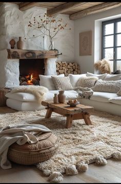 a living room filled with lots of furniture and a fire place in the middle of it